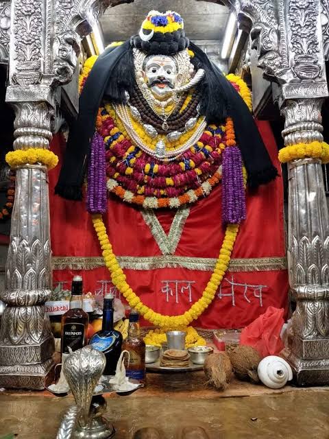 Kaal Bhairav idol with traditional offerings
